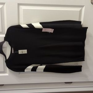 Say What medium black and white sweater.